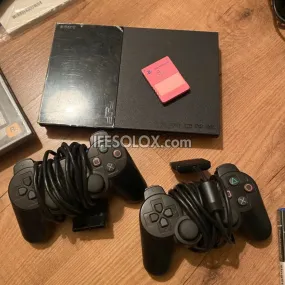 Sony Playstation 2 (PS2) Slim Game Console Complete Set with 2 DUALSHOCK Wired Controllers & 10 Games - Foreign Used